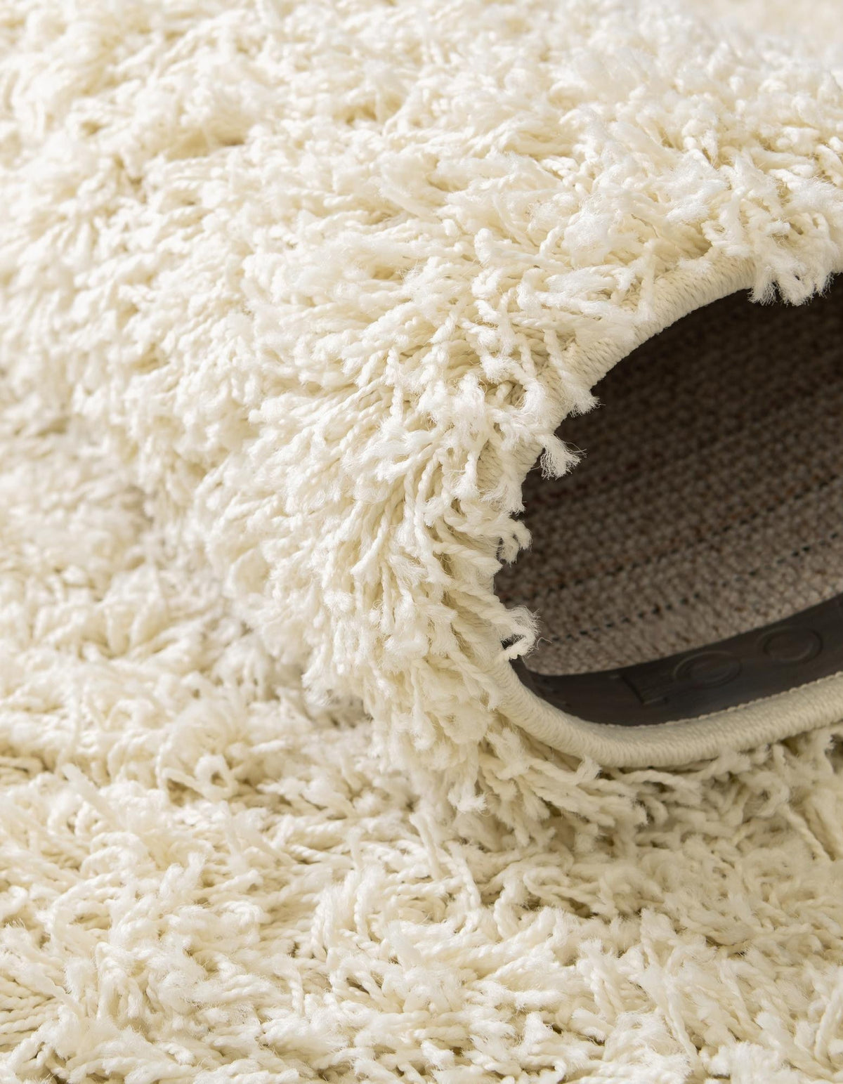 Quadratisch Hochflorteppich Solid Shag in Beige von Hadorn™ - Lifestyle Image