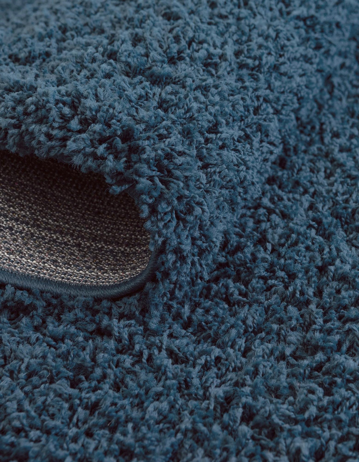 Rund Hochflorteppich Solid Shag in Blau von Hadorn™ - Lifestyle Image