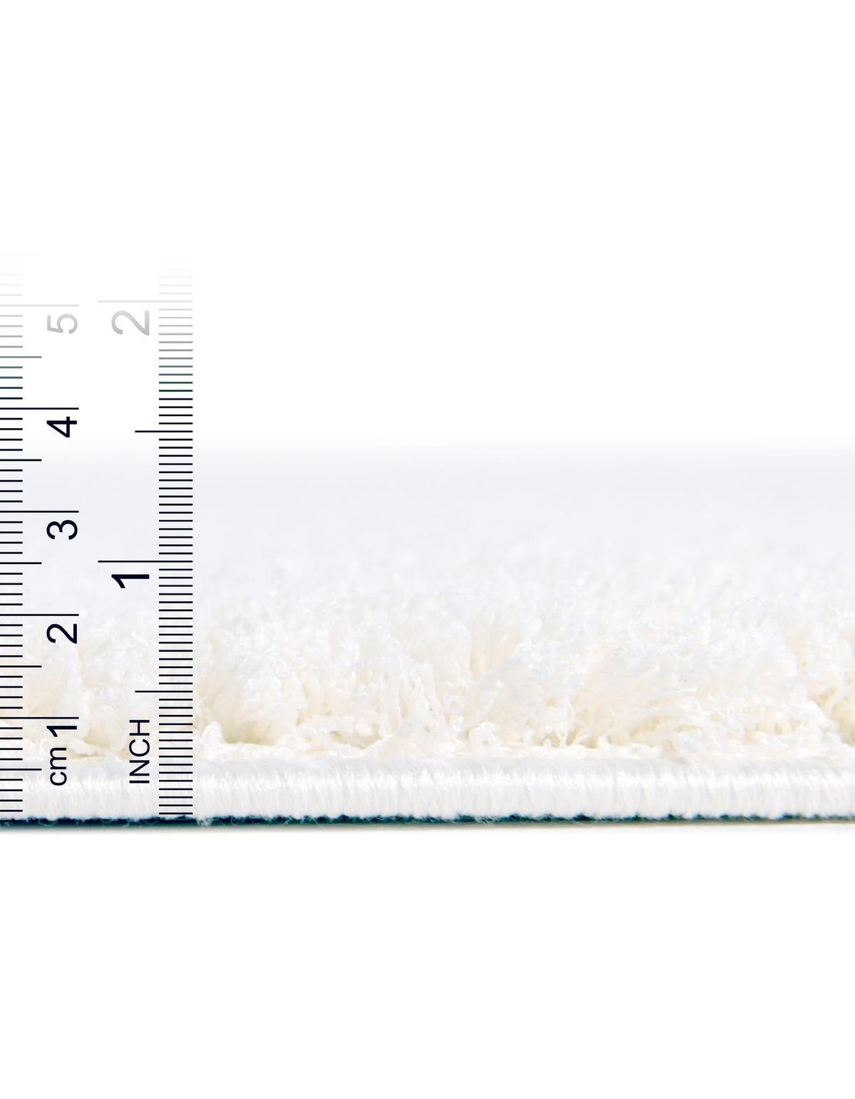 Rechteck Hochflorteppich Studio Solid Shag in Weiss von Hadorn™ - Lifestyle Image