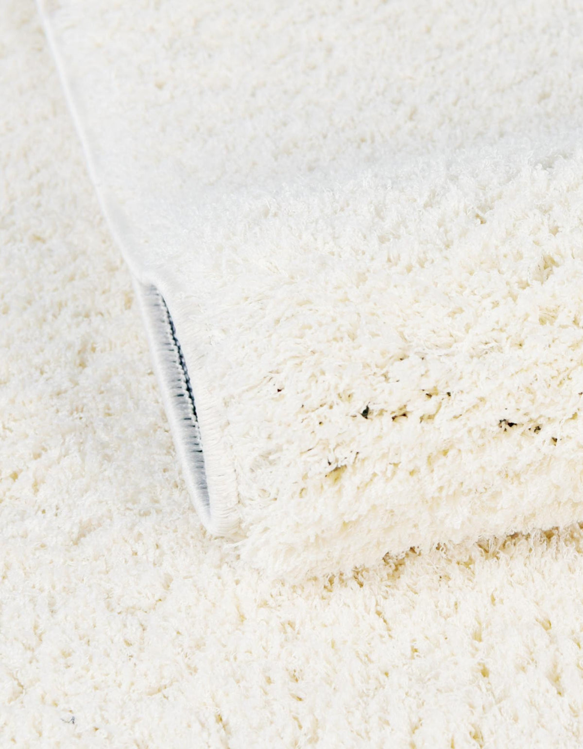 Rechteck Hochflorteppich Studio Solid Shag in Weiss von Hadorn™ - Lifestyle Image