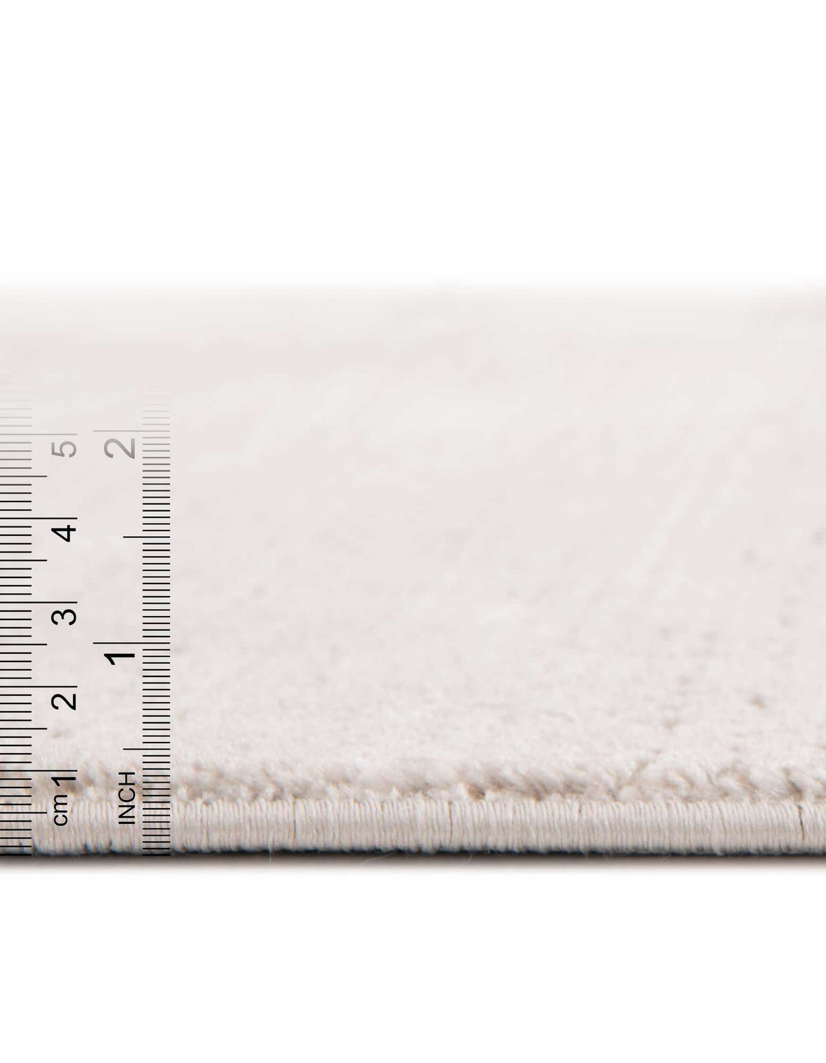 Rund Teppich Bellevue in Braun von Hadorn™ - Lifestyle Image