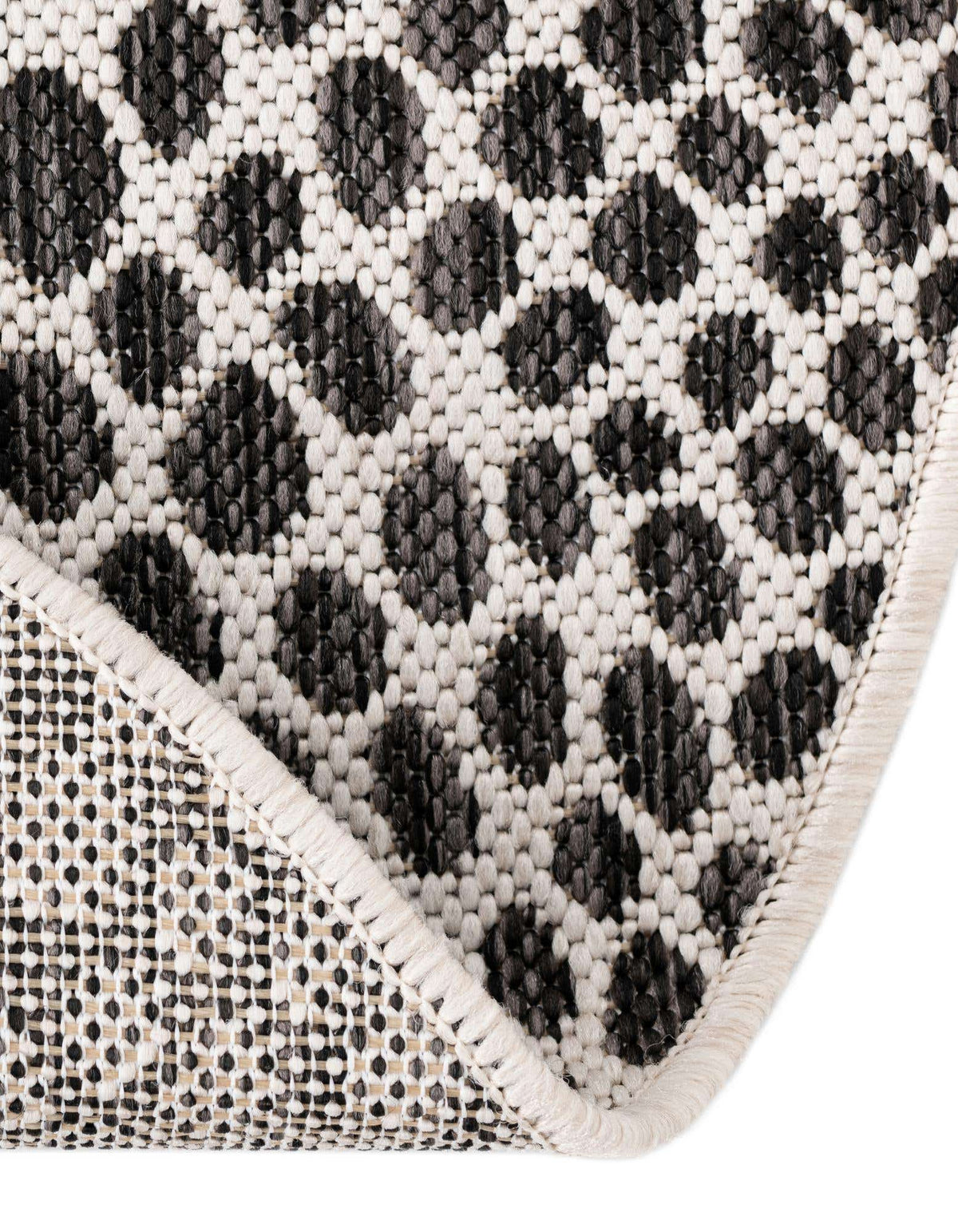 Rund Outdoor Teppich Tulum Outdoor in Schwarz von Hadorn™ - Lifestyle Image