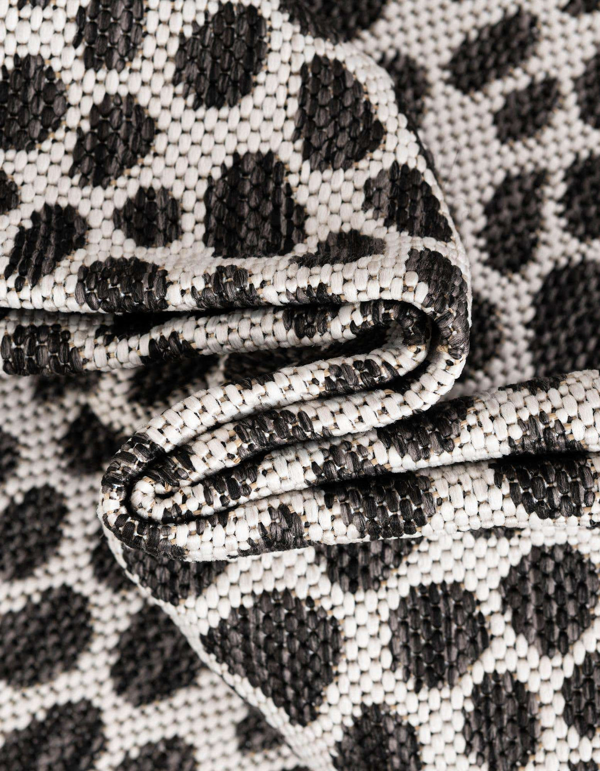 Rechteck Outdoor Teppich Tulum Outdoor in Schwarz von Hadorn™ - Lifestyle Image