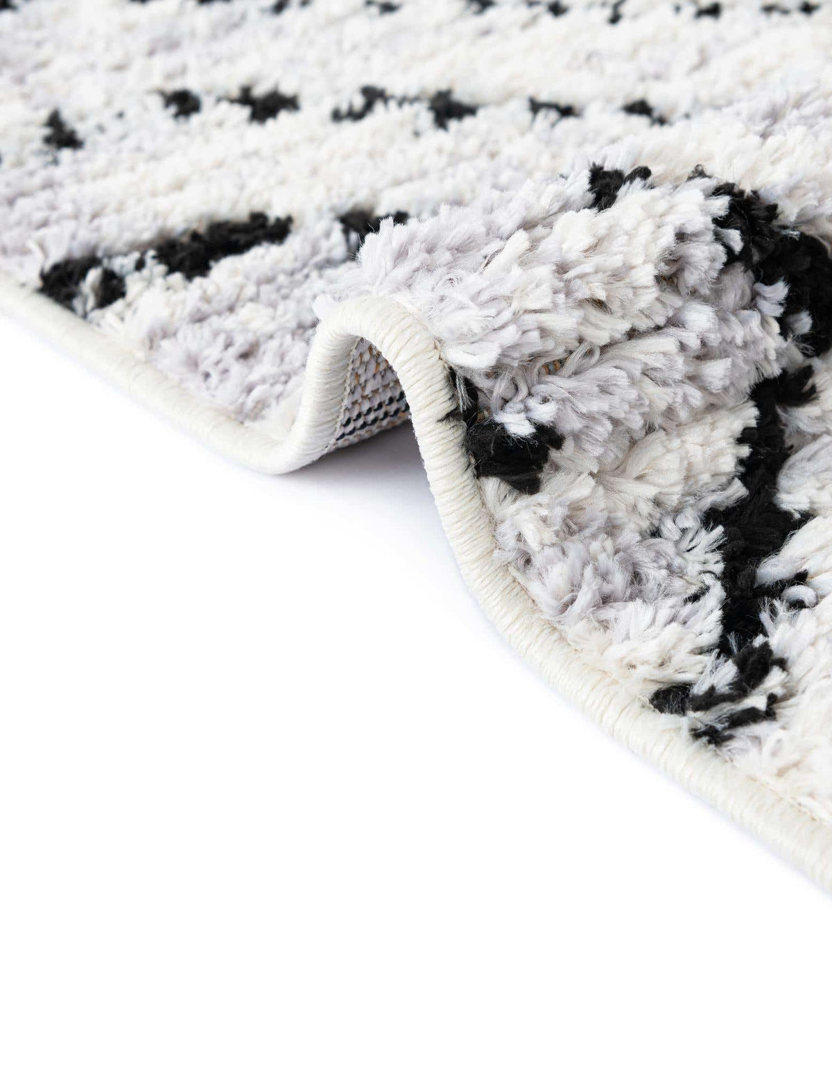 Rechteck Teppich Tagine in Schwarz und Weiss von Hadorn™ - Lifestyle Image