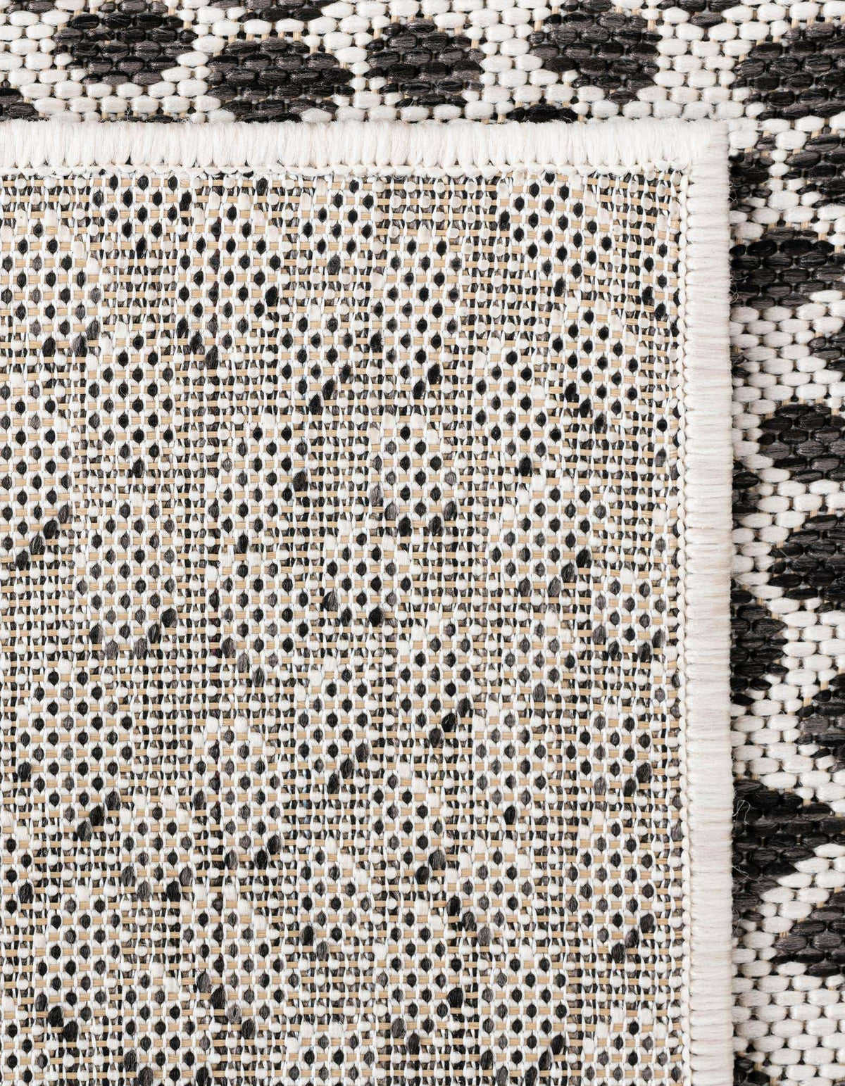 Achteck Outdoor Teppich Tulum Outdoor in Schwarz von Hadorn™ - Lifestyle Image