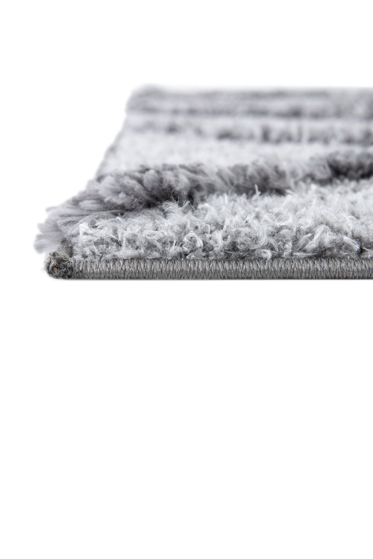 Rechteck Teppich Thun Tribus in Grau von Hadorn™ - Lifestyle Image