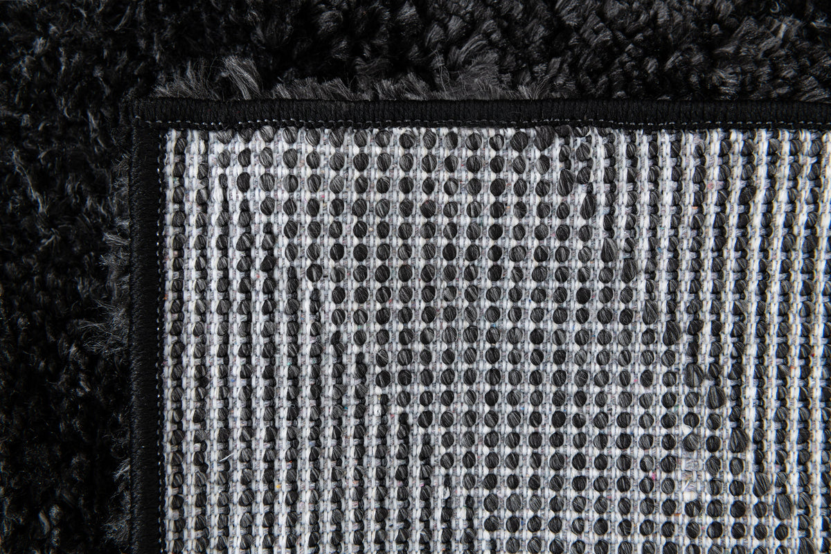 Rechteck Teppich Thun Avis in Schwarz von Hadorn™ - Lifestyle Image