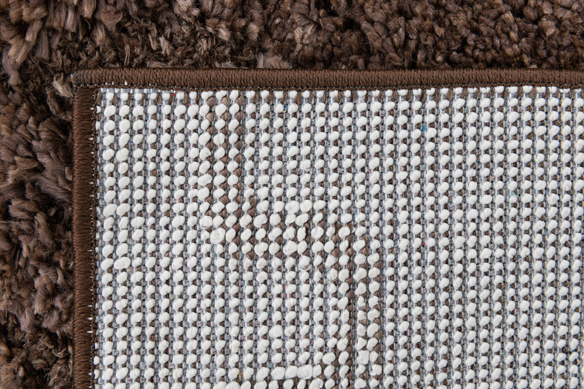 Rechteck Teppich Thun Scutum in Braun von Hadorn™ - Lifestyle Image