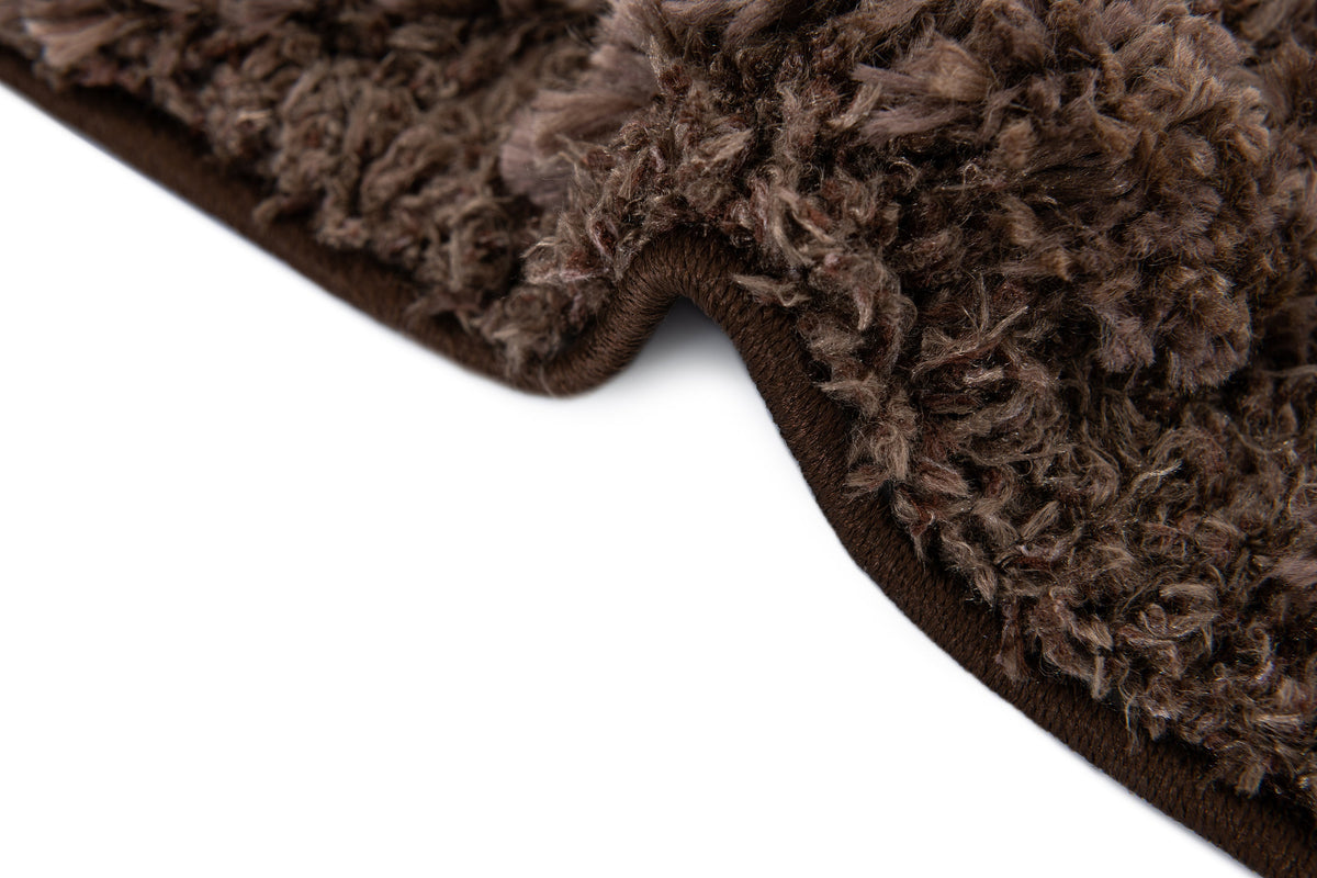 Rechteck Teppich Thun Scutum in Braun von Hadorn™ - Lifestyle Image