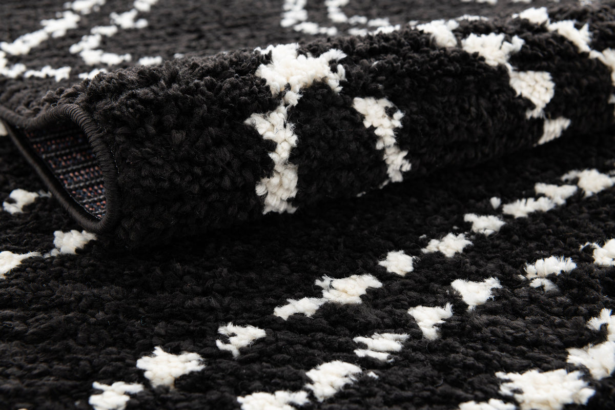 Rechteck Teppich Frauenfeld Vaiana in Schwarz von Hadorn™ - Lifestyle Image