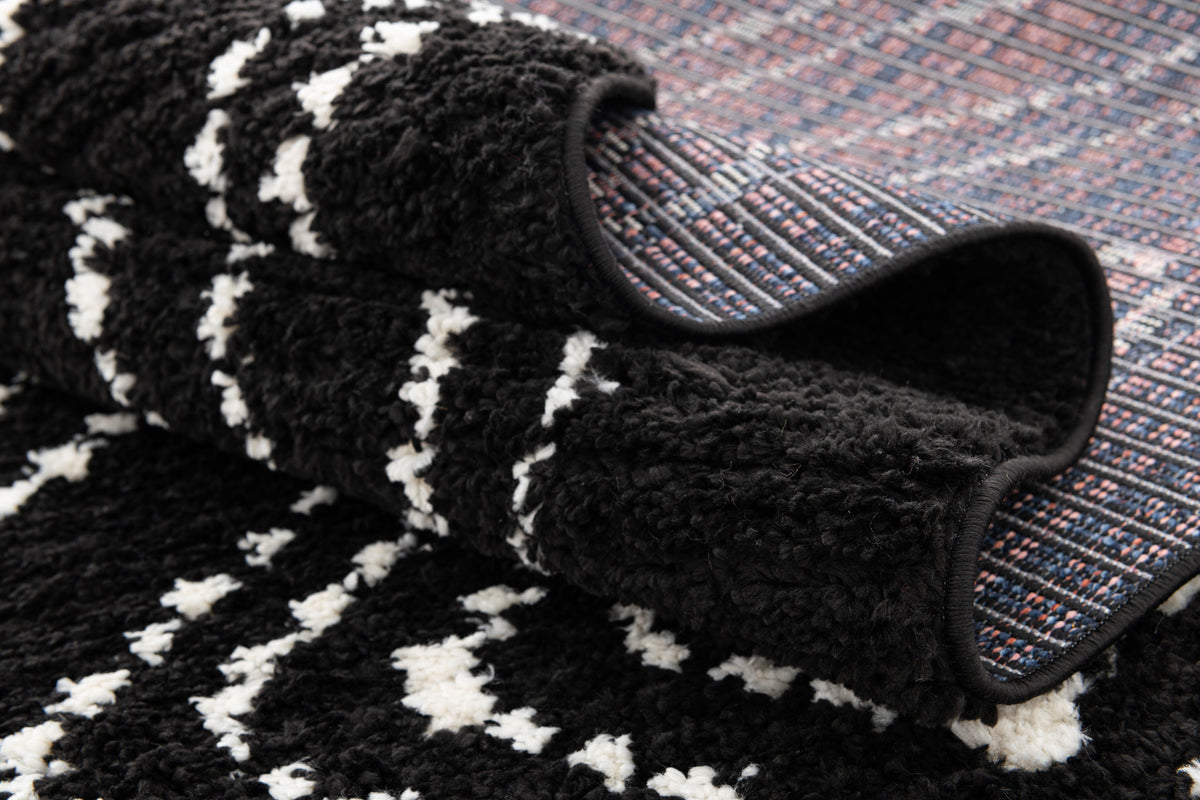 Rechteck Teppich Frauenfeld Vaiana in Schwarz von Hadorn™ - Lifestyle Image