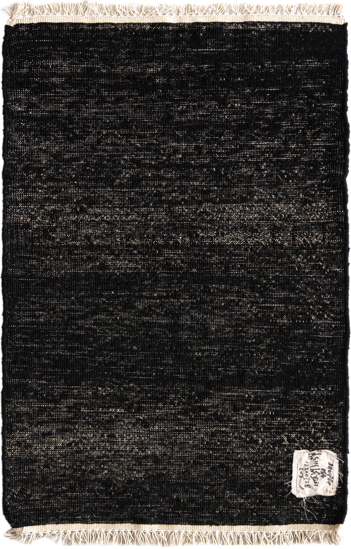 Wolle Teppich Juma Kelim in Schwarz von Hadorn™ - Lifestyle Image
