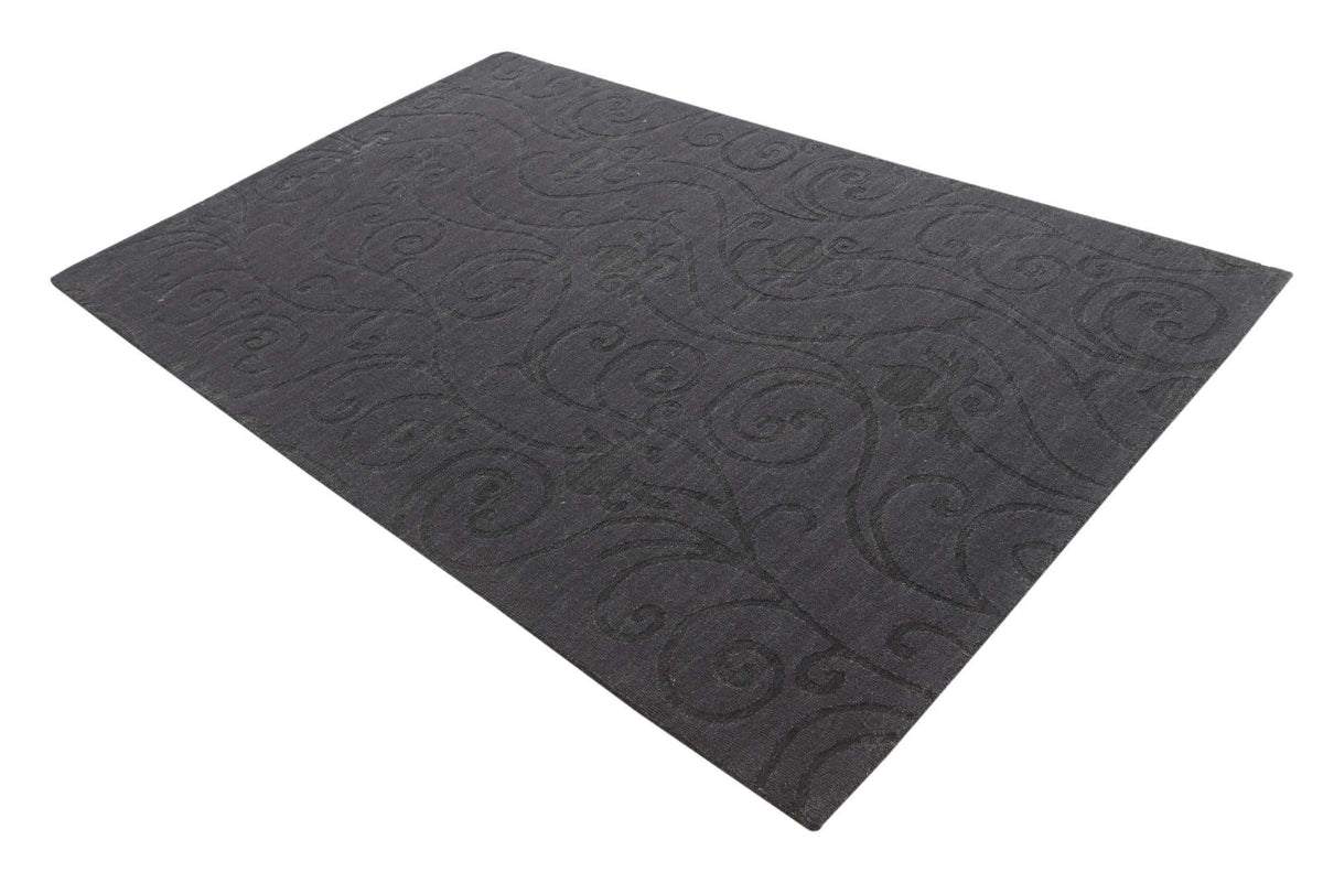 Wolle und Baumwolle Teppich Luna in Schwarz von Hadorn™ - Lifestyle Image