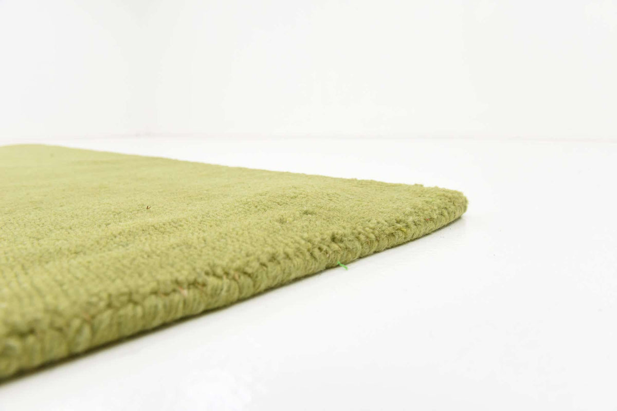 Wolle Teppich Gabbeh Design in Grün von Hadorn™ - Lifestyle Image