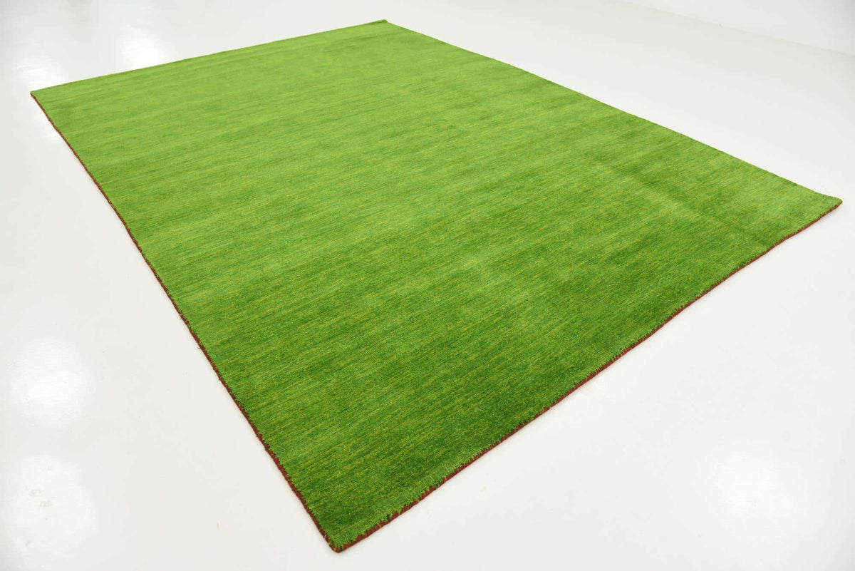 Wolle Teppich Solid Gabbeh in Hellgrün von Hadorn™ - Lifestyle Image