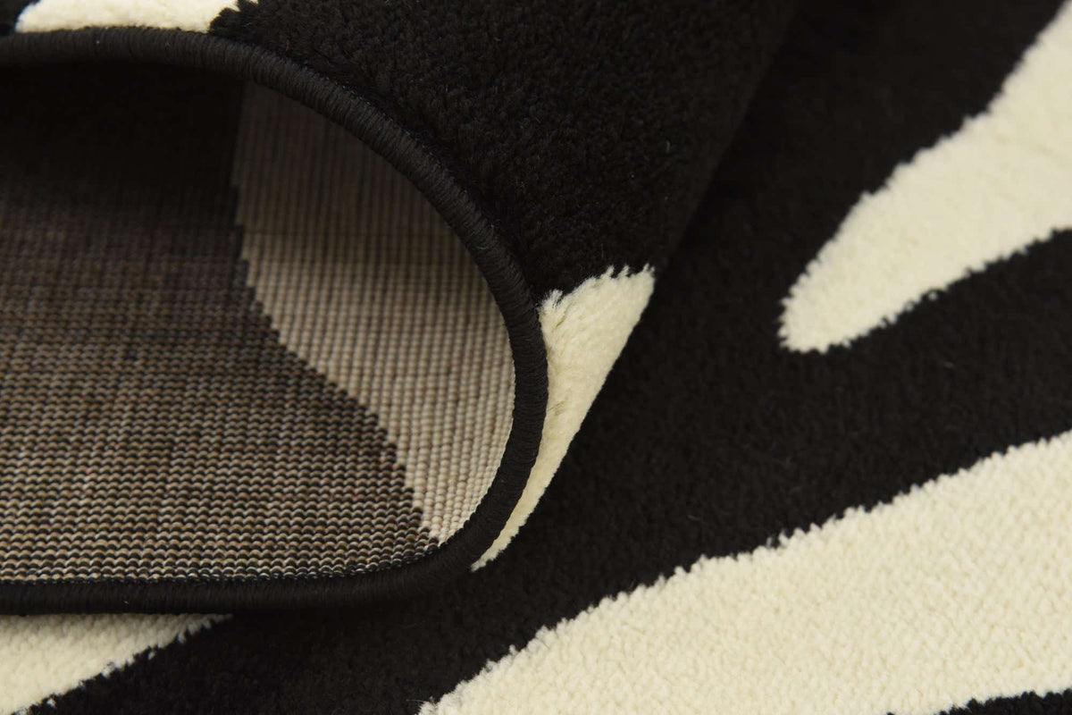 Rechteck Teppich Safari in Schwarz von Hadorn™ - Lifestyle Image