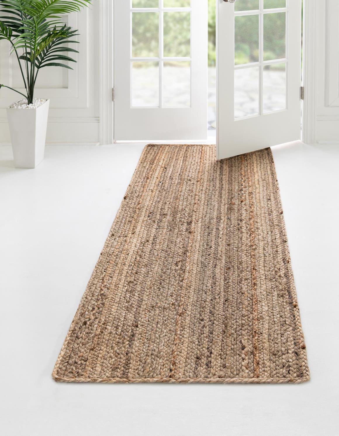 Läufer Handgeflochten Teppich Braided Jute in Natürlich von Hadorn™ - Lifestyle Image
