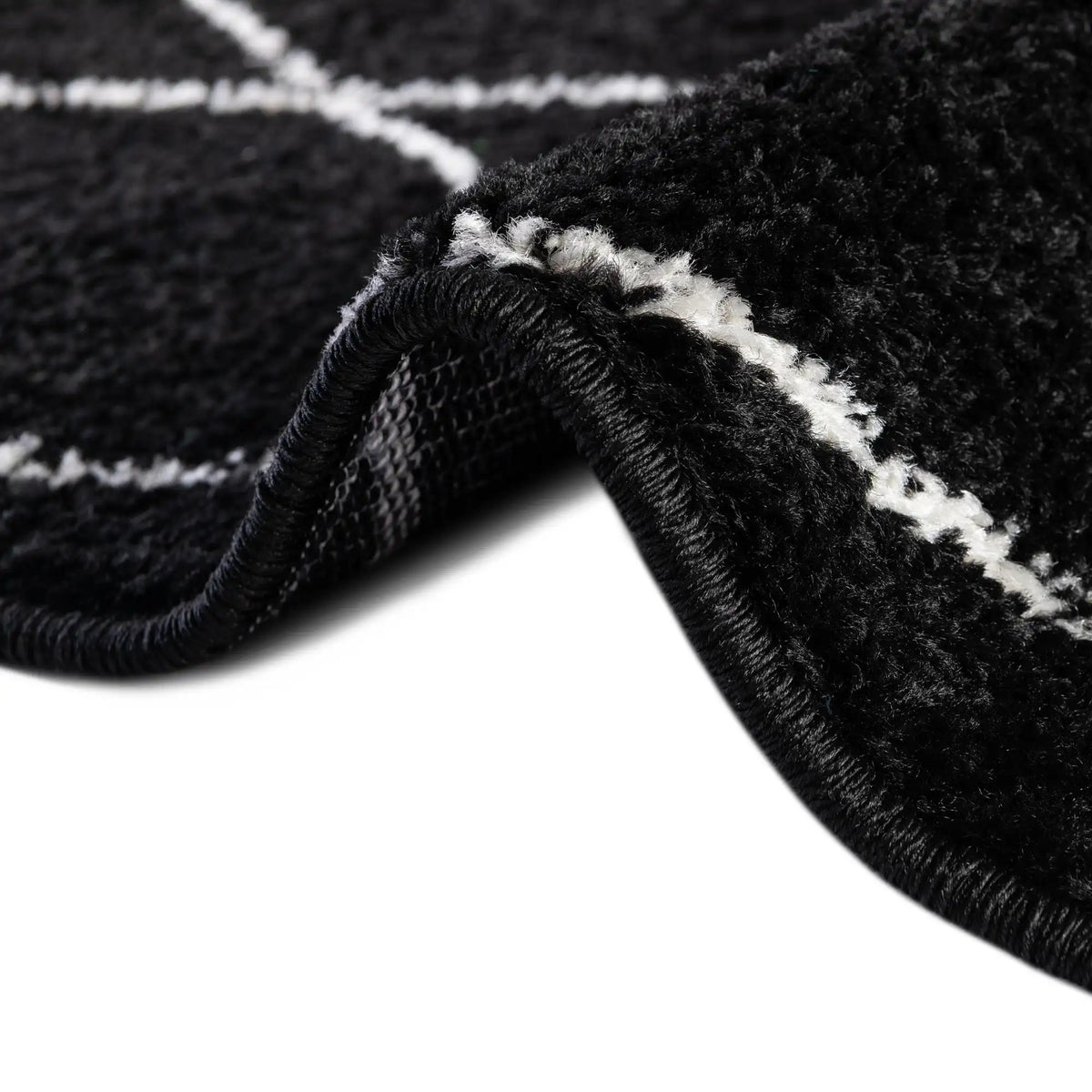 Rund Teppich Trellis Frieze in Schwarz von Hadorn™ - Lifestyle Image