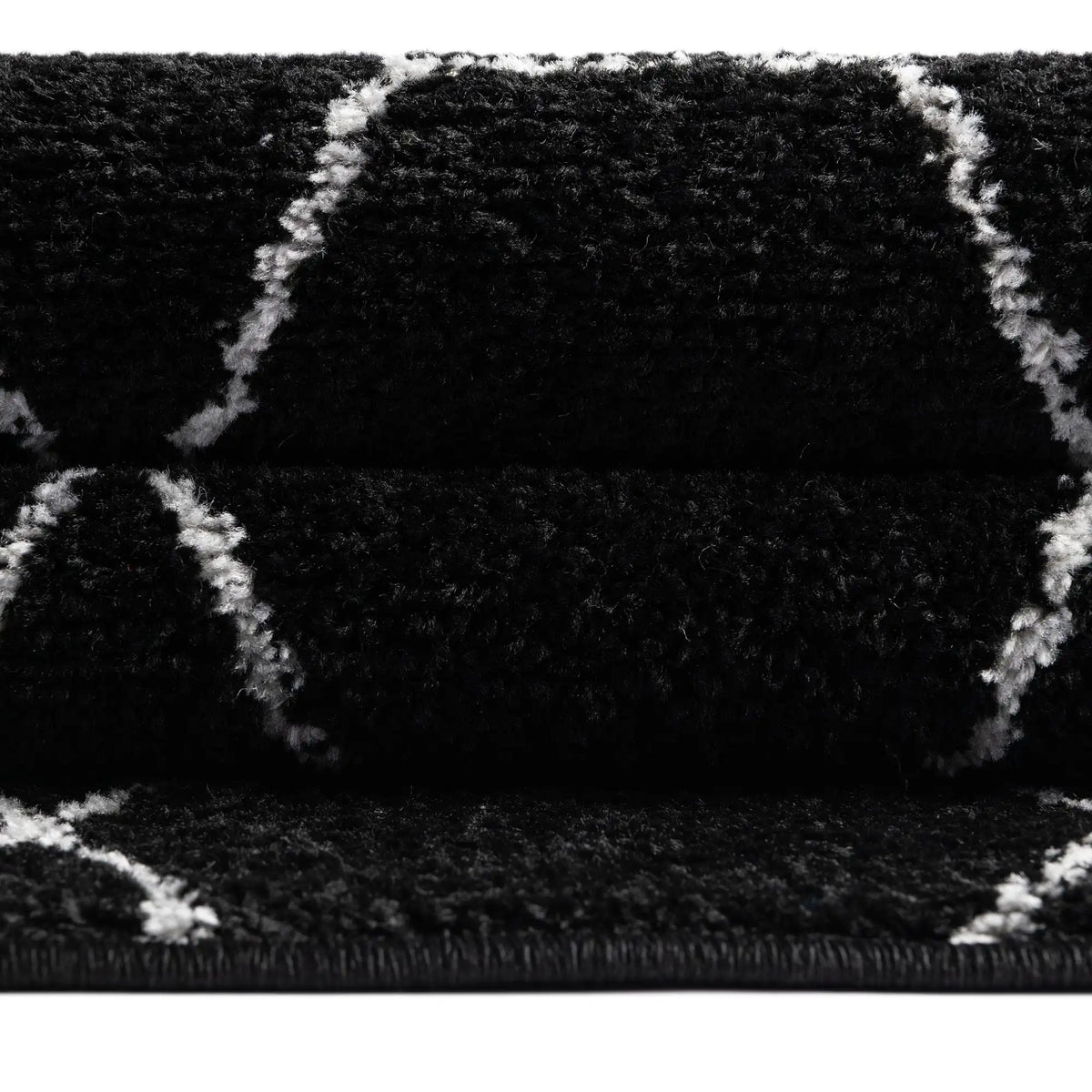 Rund Teppich Trellis Frieze in Schwarz von Hadorn™ - Lifestyle Image