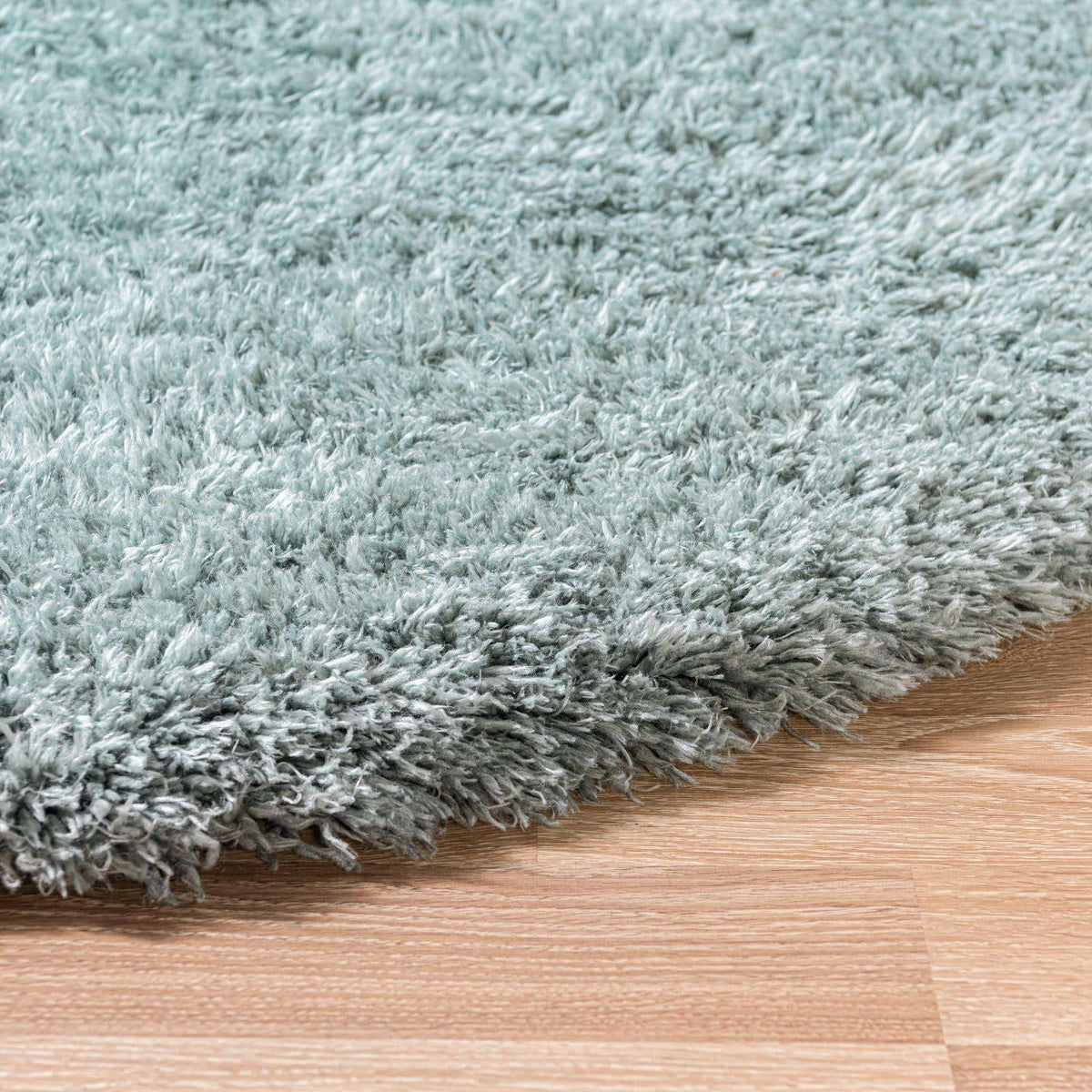 Rund Hochflorteppich Infinity Shag in Schieferblau von Hadorn™ - Lifestyle Image