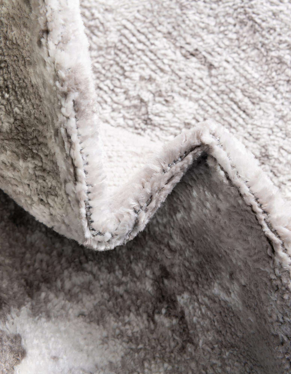Rund Teppich Aurora in Steingrau von Hadorn™ - Lifestyle Image